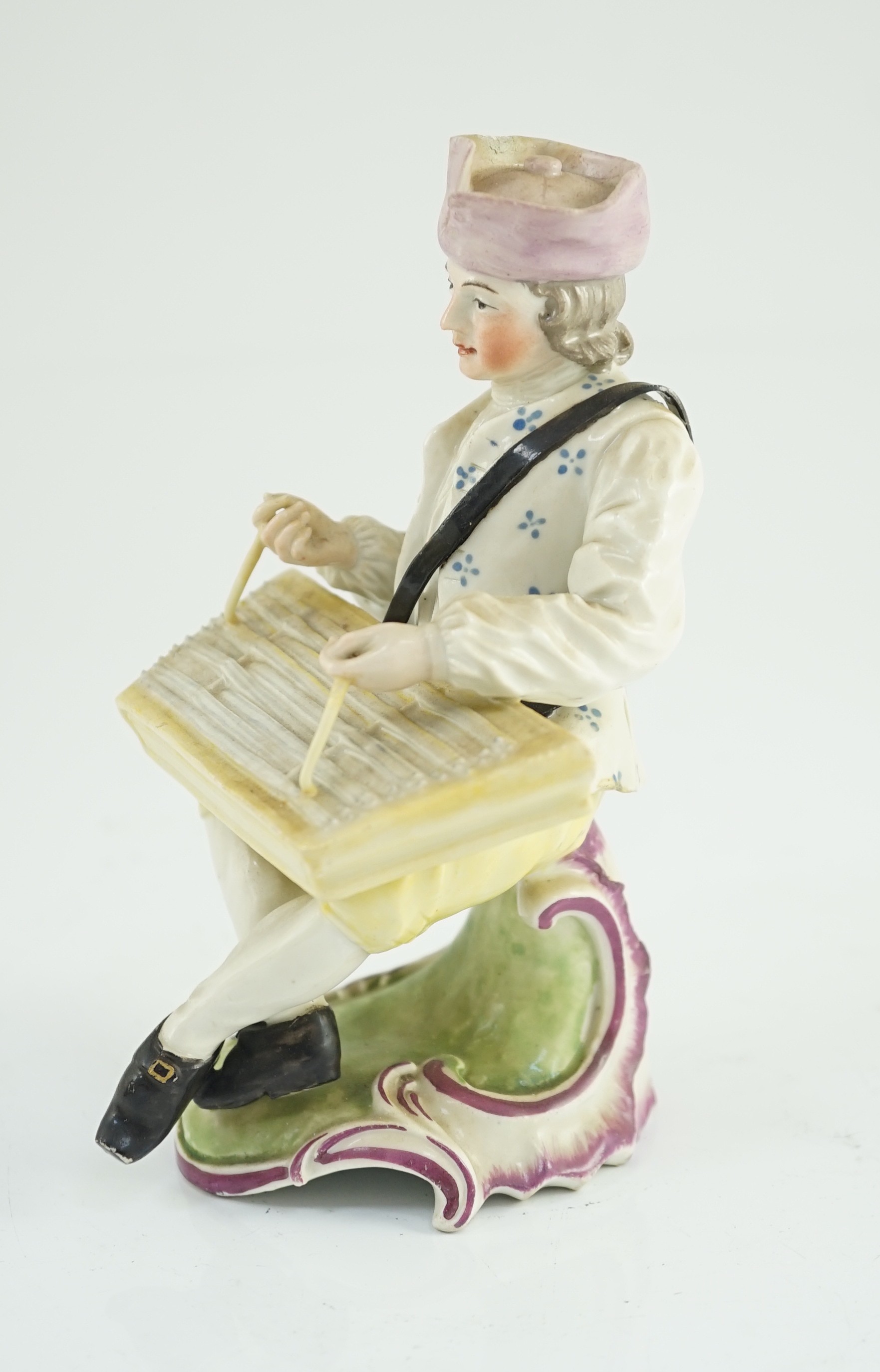 A Frankenthal porcelain figure of a zither player, c.1760, 15cm high, small areas of restoration, Provenance - purchased from Winifred Williams, Eastbourne/London before 1970.